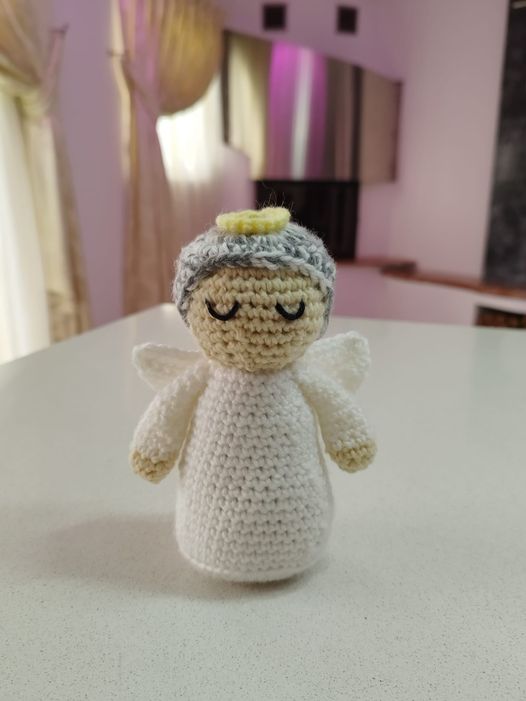 Crocheted angel plushie