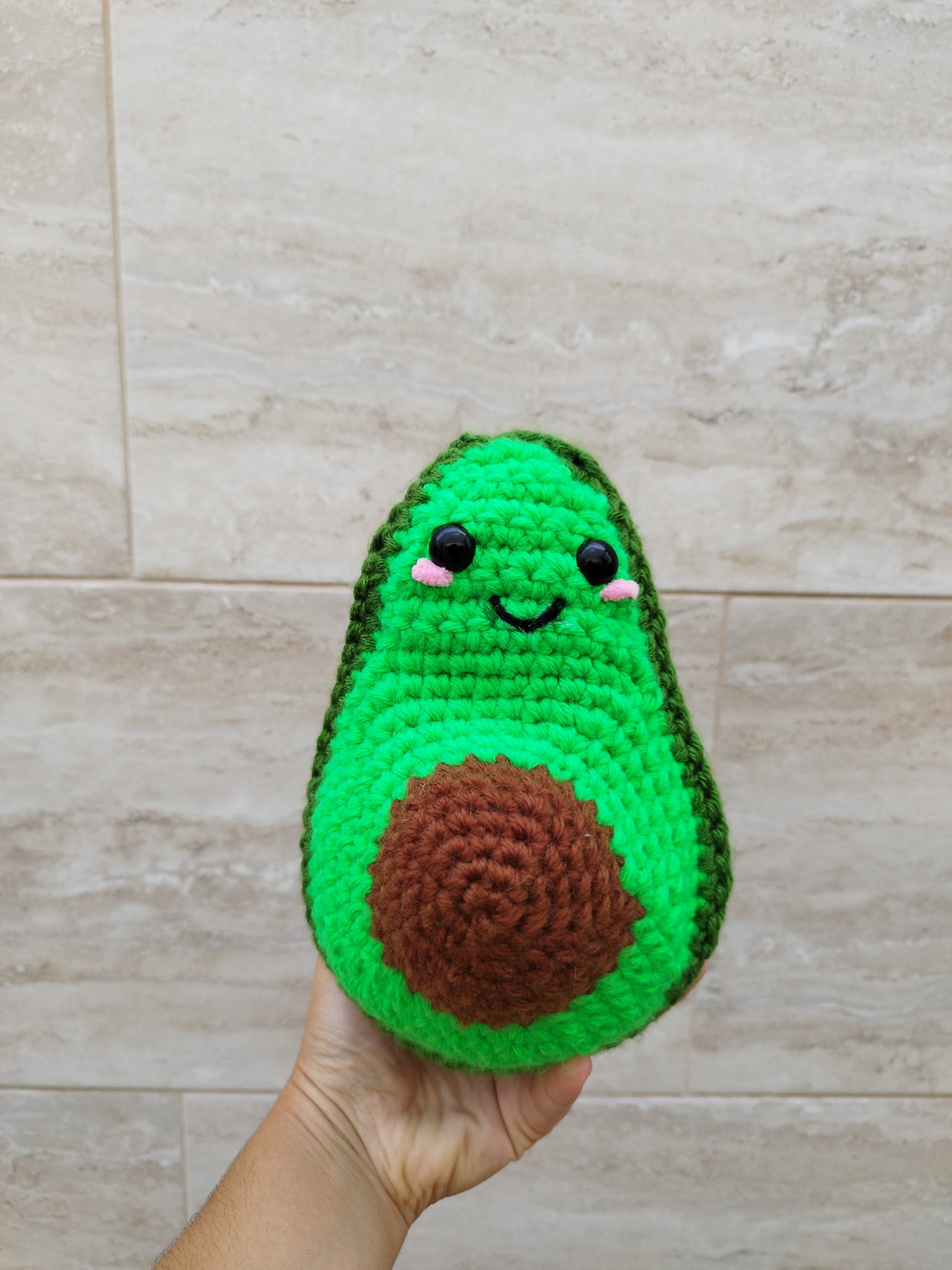 Crocheted avocado plushie