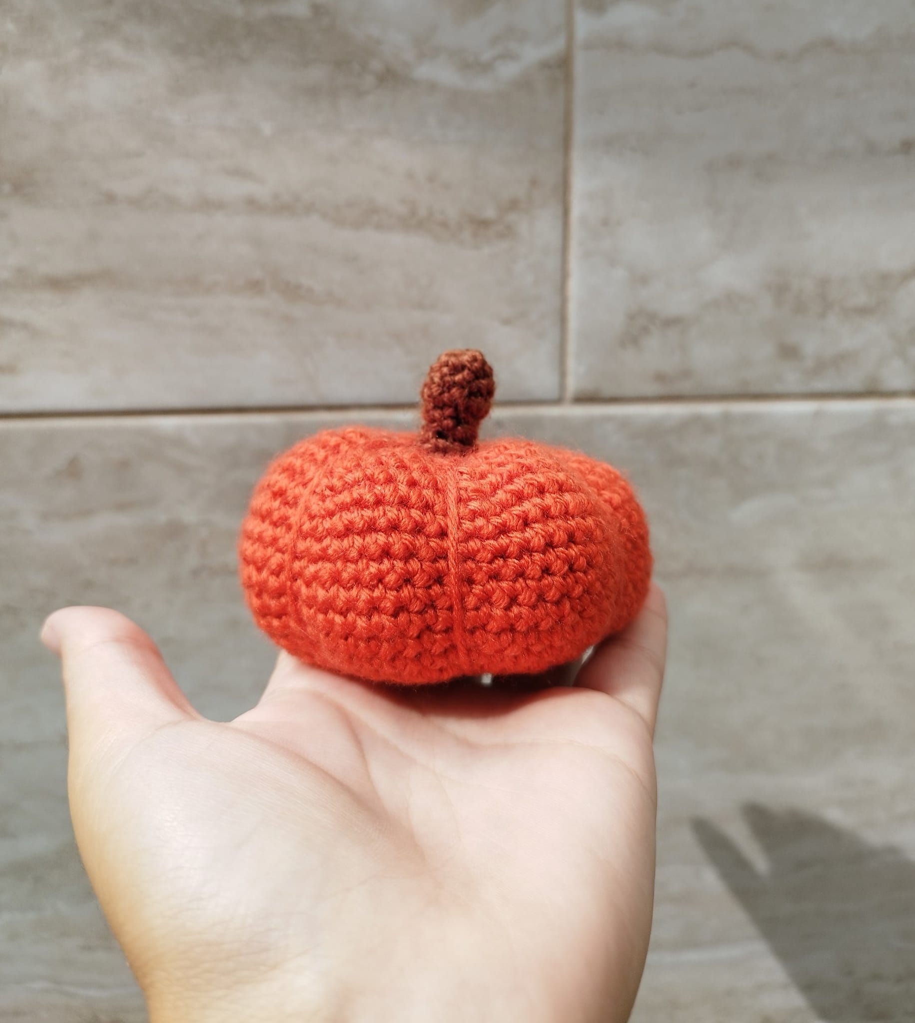 Crocheted pumpkin plushie